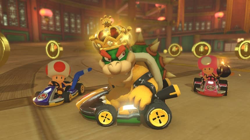 Bowser pilotant dans Mario Kart 8 Deluxe, personnage lourd privilégiant la vitesse de pointe